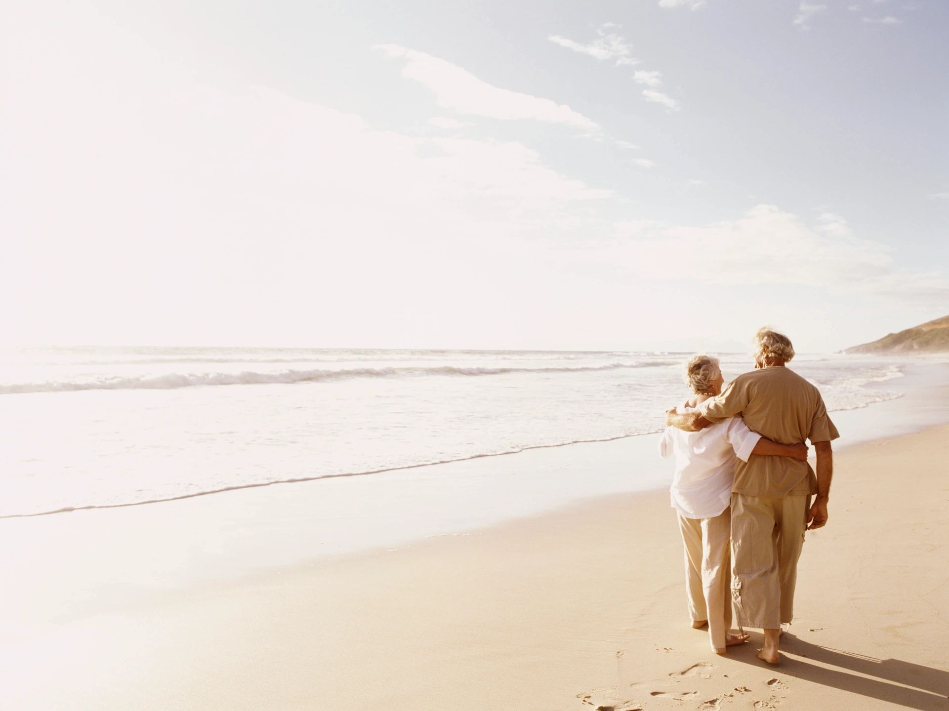elderly couple on beach